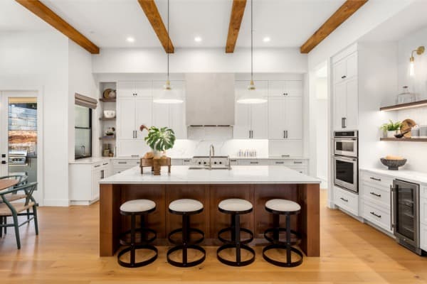 kitchens with white cabinets and backsplashes